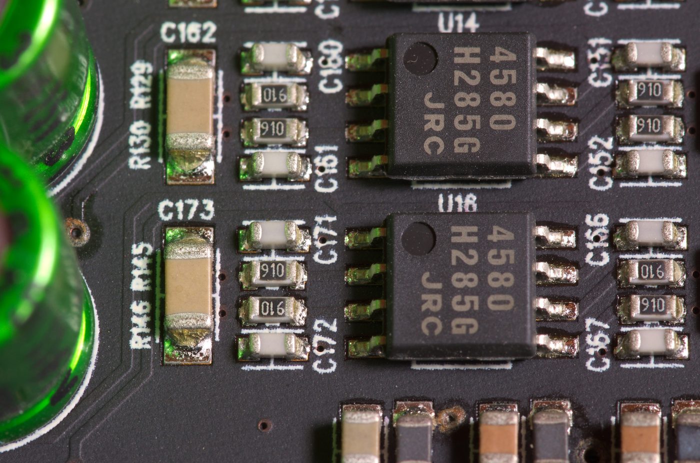 Macro close-up of a printed circuit board with surface-mount components